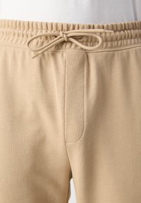 HUGO NAPIN - Tréningruha alsók - medium beige