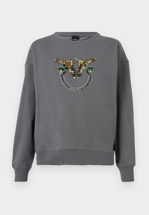 Γκρι φούτερ με μακριά μανίκια, με πολύχρωμα παγιετέ πουλιά να κοιτούν το ένα το άλλο πάνω από μια καμπυλωτή γραμμή από ασημένιες χάντρες στο στήθος.