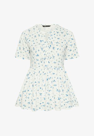 Weiße Kurzarmbluse mit kleinem blauem Blumenmuster, rundem Ausschnitt und zwei vorderen Bindeschlaufen.