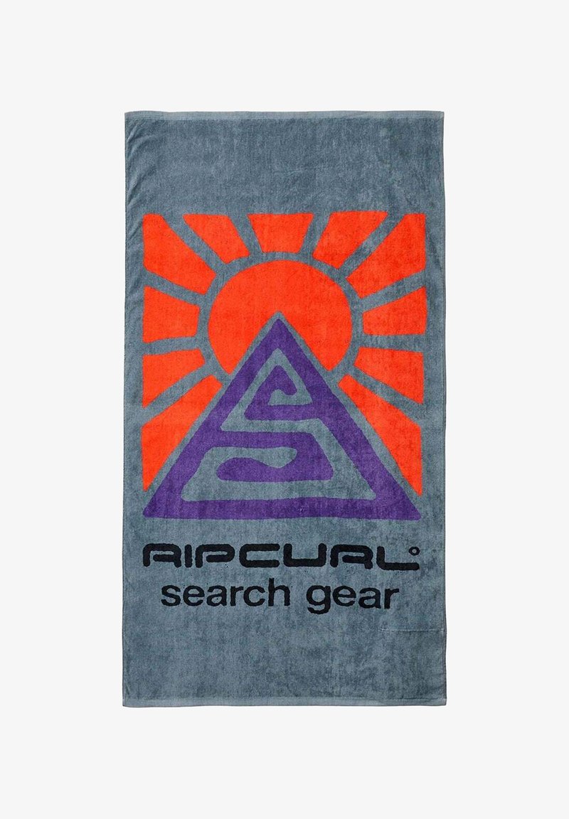 Blåt håndklæde med orange solstråler og lilla trekantet logo over sort "Rip Curl search gear" tekst.
