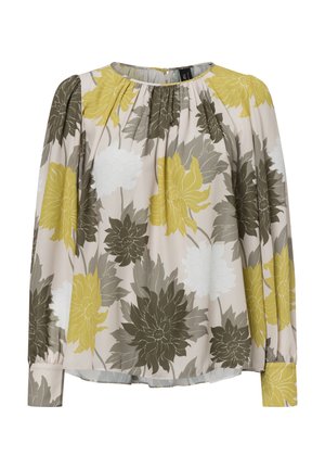 Bluse mit langen Ärmeln und floralem Muster, gefalteter Ausschnitt, mit gelben, grünen und weißen Blumenmustern auf einem beigen Hintergrund. Weicher Stoff.