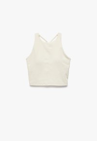 Lyhyt toppi, joka on valmistettu pehmeästä, vaaleanbeigestä kankaasta. Siinä on pyöreä kaula-aukko, urheilullinen selkäosa ja minimalistinen estetiikka.