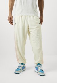 Nike Performance ICON PANT  - Træningsbukser - coconut milk/washed coral/black