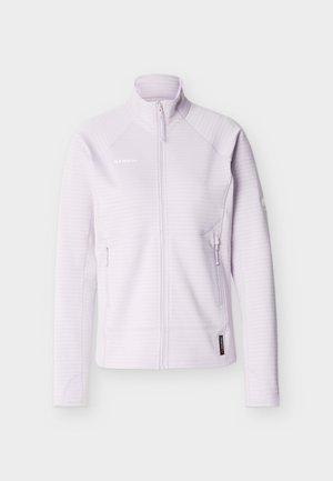 Veste zippée violet clair avec col montant, deux poches latérales zippées et logo Mammut sur la poitrine et la manche.
