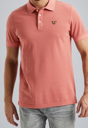 Pink polo shirt made of cotton with short sleeves, three-button placket, and a small embroidered logo on the left chest.