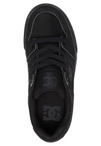 Black skate shoe with a textured upper, rounded toe, flat laces, and logo on the tongue. Features stitched accents and a sturdy sole.