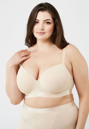 Beige naadloze bh met gladde cups en verstelbare bandjes. Voorzien van een brede, elastische band met het merkteken. Huidkleurig, lichtgewicht materiaal.