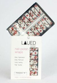 Nagellack-Folien mit einem glänzenden weißen Grundton, die rote Blumenastmuster zeigen. Packung enthält 16 Stück mit einfacher Anwendung und Entfernung.