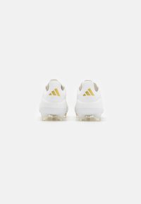 adidas Performance F50 PRO FIRM GROUND - Jalkapallokengät kiinteälle alustalle - footwear white/gold metallic