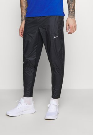SHIELD - Pantalon de survêtement - black/reflective silver