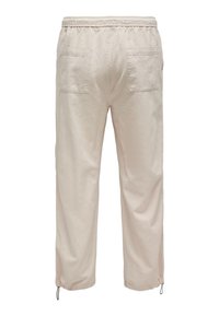Jasnobeżowe lniane spodnie z talią na sznurek, elastycznymi mankietami i dwoma tylnymi kieszeniami, o miękkim, fakturowanym wykończeniu.