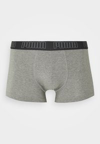 Graue Baumwoll-Boxershorts mit einem schwarzen Logobund, die einen engen Sitz und minimale Nahtdetails aufweisen, geeignet für den Alltagsgebrauch.
