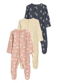 Trois combinaisons pieds pour enfants : rose avec des motifs abstraits blancs, jaune pâle avec des designs blancs, et bleu marine avec des ananas blancs.