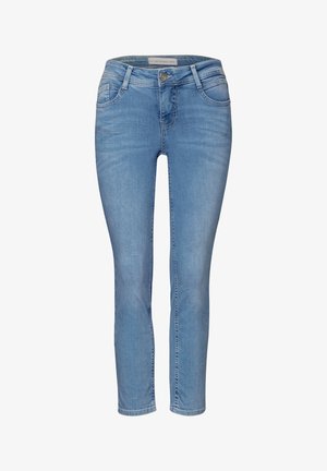 Světle modré džíny se slim fit střihem, středně vysokým pasem, předními kapsami a jedním knoflíkem na zapínání. Klasický design s pěti kapsami a detaily šití.