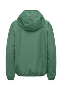 Žalia, lengva striukė su kapišonu. Turi elastines rankogalius ir apačią. Lygūs tekstūra, minimalistinis dizainas, tinkama kasdieniam dėvėjimui.