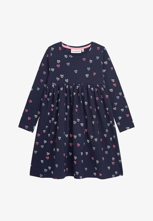 Marineblaue Langarmkleid mit Empire Taille, das ein verstreutes Herzmuster in Rosa, Weiß und Hellblau aufweist. Hergestellt aus weicher Baumwolle.