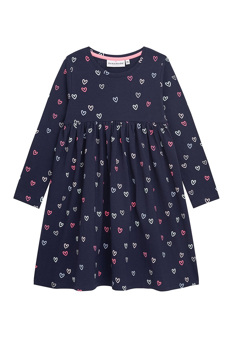 Marineblaue Langarmkleid mit Empire Taille, das ein verstreutes Herzmuster in Rosa, Weiß und Hellblau aufweist. Hergestellt aus weicher Baumwolle.