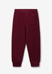 Burgunderfarbene Sweatpants mit geripptem Bund und Bündchen, ausgestattet mit einer einzelnen Gesäßtasche und einer glatten Baumwolltextur.