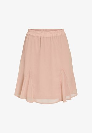 Light pink, knee-length skirt made of soft, textured fabric with elastic waistband and side slits for movement. Lightweight and flowy design.