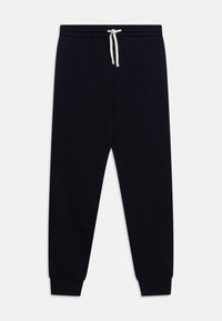 Marine joggebukser laget av mykt stoff, med elastisk midjebånd og hvit snor, sidelommer og avsmalnede mansjetter.