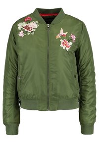 Zelená bomber bunda s vyšívanými květinovými vzory v růžové a bílé. Zapínání na zip, žebrované manžety a lem, hladká textura.