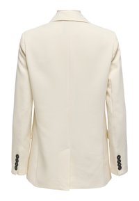 Vue arrière d’un blazer crème ajusté avec un revers cranté, des manches longues, des boutons noirs aux poignets et une fente centrale au dos.