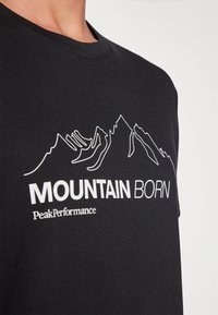 Peak Performance EXPLORE GRAPHIC TEE - T-shirts print - black