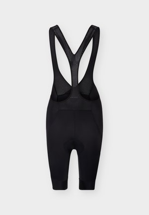 Μαύρο ποδηλατικό σορτς με τιράντες, με επένδυση στο κάθισμα και αναπνεύσιμες διχτυωτές τιράντες στους ώμους, σχεδιασμένο για αθλητική χρήση.