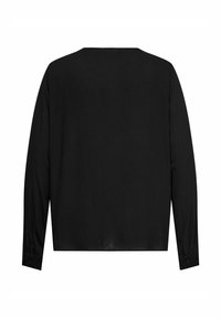 Melnā garroku krekls ar pogājamiem aproču galiem, redzams no aizmugures, ar taisnu apakšu un vienkāršu apaļu apkakli.