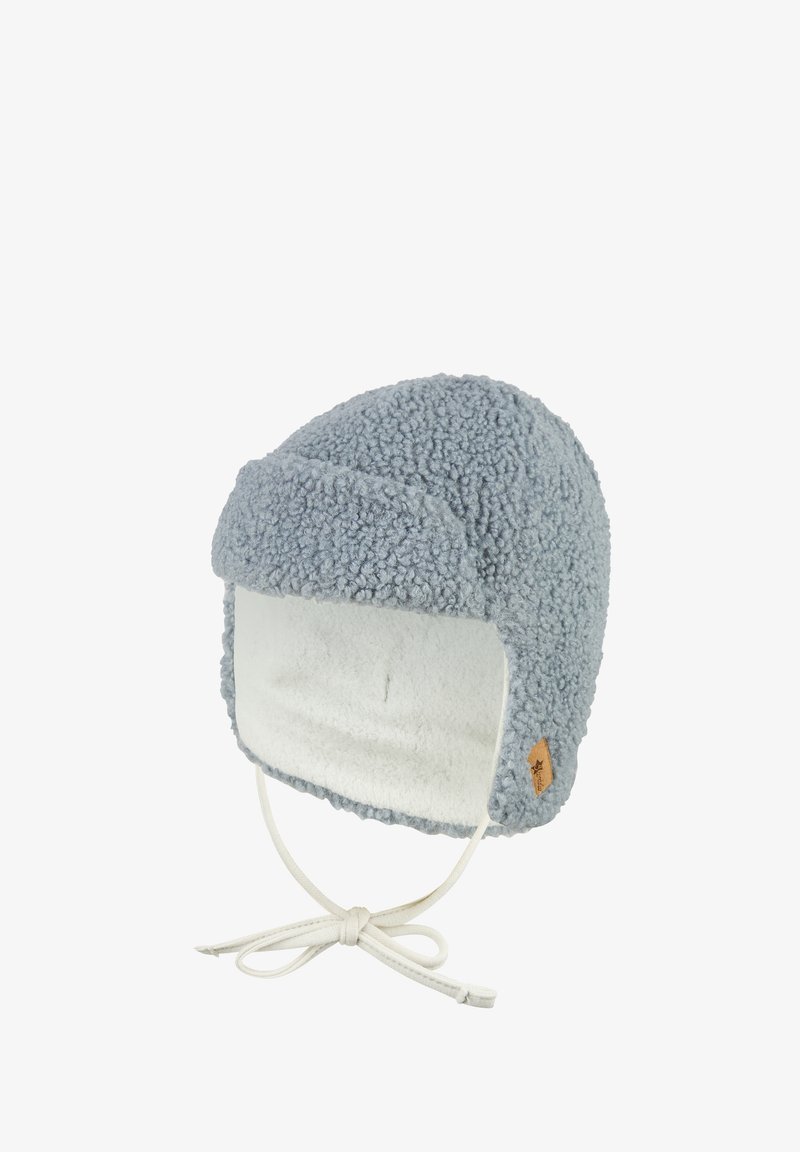 Light blue, fuzzy fleece hat with a soft lining, a front flap, and a chin strap. Features a small brown tag on the side.