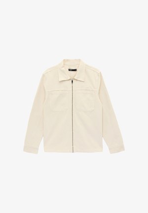 Jasnobeżowa kurtka na zamek z bawełny z kołnierzykiem, dwoma kieszeniami na piersi i długimi rękawami. Gładka faktura bez widocznych wzorów.