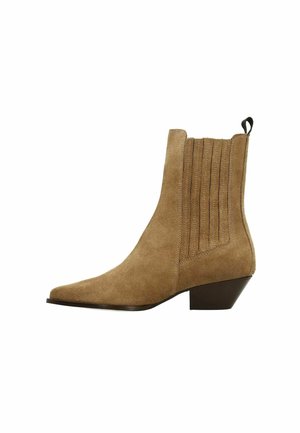 Brown suede ankle boot with a pointed toe, ribbed accents on sides, and a low heel. Features a loop for easy pulling on.