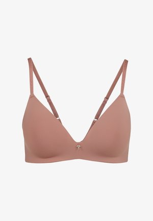 Mauve-Farbe Wireless-BH mit tiefem V-Ausschnitt, verstellbaren Trägern und einem dekorativen silbernen Charm in der Mitte. Weiches Material mit glatter Textur.