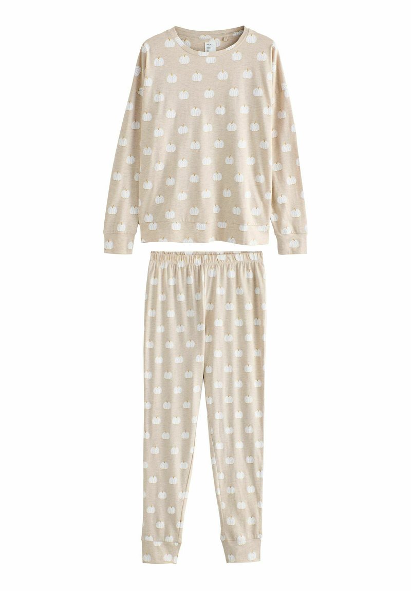 Beige pyjamastel met een lange mouwen-top en een elastische taillebroek, beide met kleine witte pompoenpatronen. Zacht katoenen materiaal.
