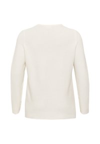 Top de manga larga color crema con un diseño de canalé texturizado, que presenta un escote redondo y una silueta ajustada.