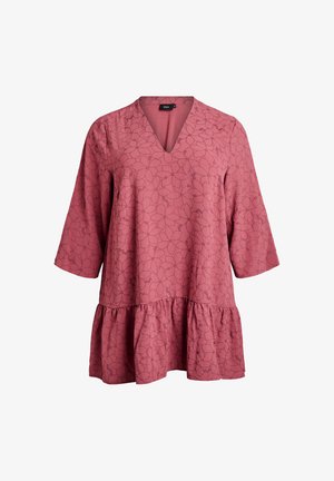 Pink tunic with a V-neck and three-quarter sleeves. Features a floral pattern and a ruffled hemline for added texture.