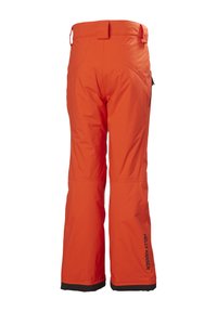 Oranžové sáňkařské kalhoty se rovnou siluetou, vybavené poutky na opasek, černým lemem na nohavicích a logem na dolní části nohy. Hladký, voděodolný materiál.