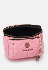 Quilted pink faux leather bag with gold hardware, zip closure, and chain strap. Features front pocket and embossed brand logo.