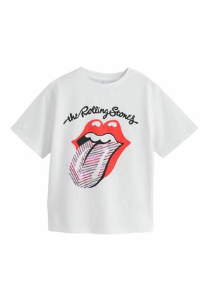 Hvid T-shirt med The Rolling Stones logo med røde læber, en stribet tunge og sort kursiv tekst over grafikken.