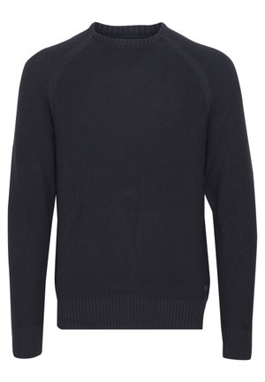 Pull en maille bleu marine foncé avec un col rond, des poignets et un ourlet côtelés, présentant un tissu texturé et des manches raglan.