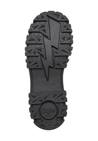 Semelle d’une chaussure noire avec un motif texturé en forme d’éclair, des grips triangulaires, un logo circulaire indiquant "Buffalo," et la taille 38.