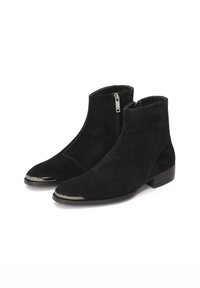 Black suede ankle boots with a sleek design, featuring a zip closure, pointed toes, and metallic accents at the front. Low block heels.