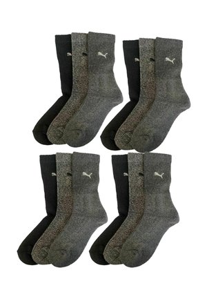 Four pairs of socks featuring a ribbed design, two in dark gray, two in black, with a subtle logo accent in white.