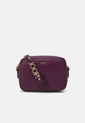 Purple leather crossbody bag with a rectangular shape, featuring a detachable strap and gold-tone logo accent on the front.