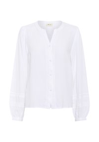 Blusa bianca a maniche lunghe con scollo rotondo, chiusura a bottoni davanti e dettagli in pizzo lungo la pattina e le maniche. Tessuto morbido e liscio.