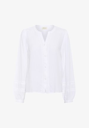 Balta ilgomis rankovėmis bluzoną su apvaliu kaklu, mygtukų priekyje ir nėriniuotu apdailu priekiu ir rankovėmis. Minkštas, glotnus audinio tekstūra.