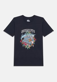 Navy cotton T-shirt featuring a colorful graphic print of a skeleton surfing with tropical plants and waves, round neck, short sleeves.