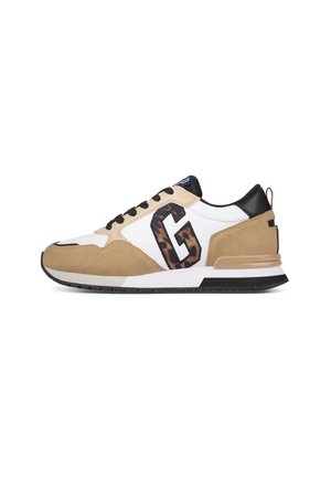 Low-top beige and white sneaker with black sole, black laces, and a large patterned "G" on the side.