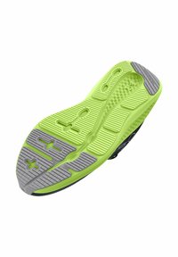 Semelle de chaussure avec un fond vert vif, présentant des sections grises texturées et des motifs de traction distincts pour une meilleure adhérence.