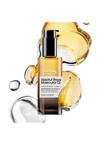 L'Oréal Absolut Repair Molecular Oil i en klar glassflaske, med et svart pumpleppe, med gylden væske og medfølgende oljedråper.
